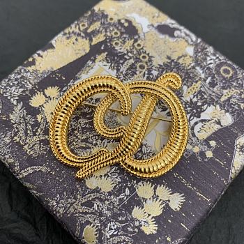 Dior letter brooch