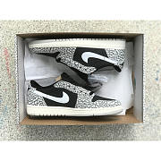 Jordan 1 Retro Low OG Black Cement - 1