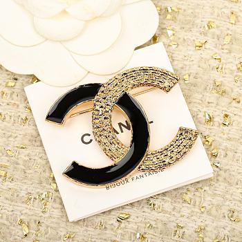 Chanel Black Gold Brooch