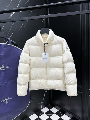 Moncler Abbadia padded down jacket in cream or off-white.