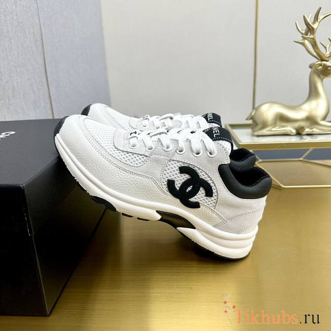 Chanel sneakers in a classic black and white - 1