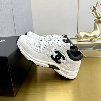 Chanel sneakers in a classic black and white