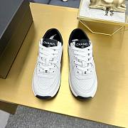 Chanel sneakers in a classic black and white - 6