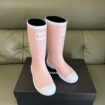 Chanel rubber rain boots in a light pink