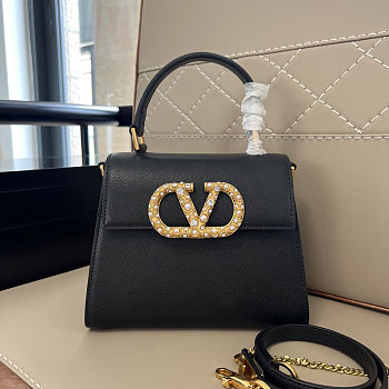 Valentino Garavani VSLING top handle bag in black  22x17x9 cm