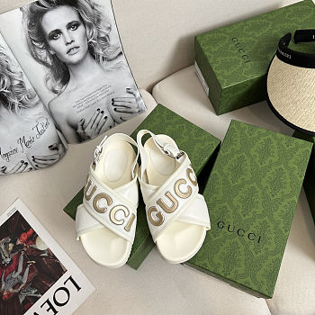 Gucci Logo-appliqué Leather Sandals in a cream/off-white color