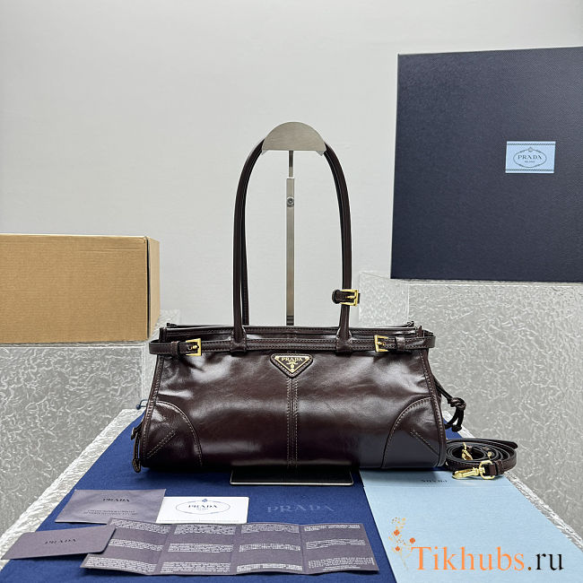 Prada Bonnie medium leather handbag in a burgundy color 32x15x13 cm - 1