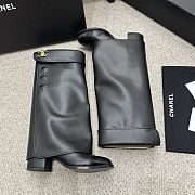 Chanel black leather fold-over boots with a cap toe and button details  - 2