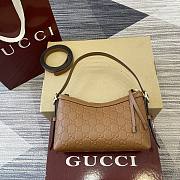 Gucci GG Emblem embossed black leather small shoulder bag in brown color 22×14×8cm - 1