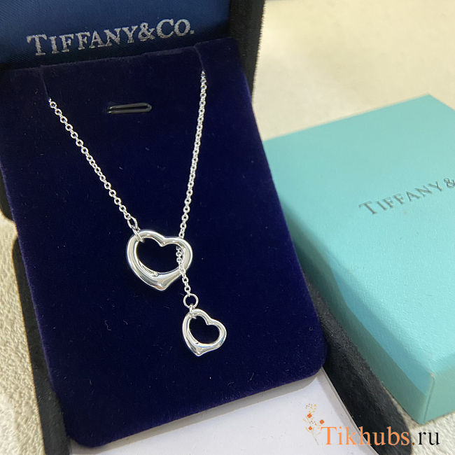 Tiffany & Co. Elsa Peretti Open Heart lariat necklace in sterling silver.  - 1