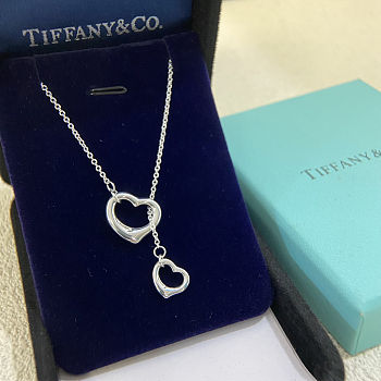 Tiffany & Co. Elsa Peretti Open Heart lariat necklace in sterling silver. 