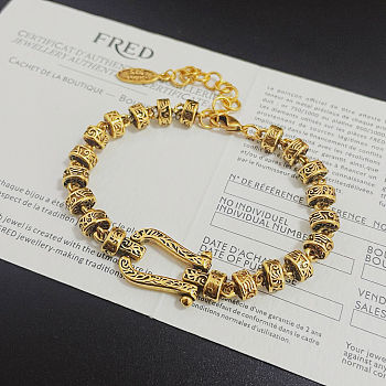 Fred bracelet with gold-plated clasp engraved with a pattern