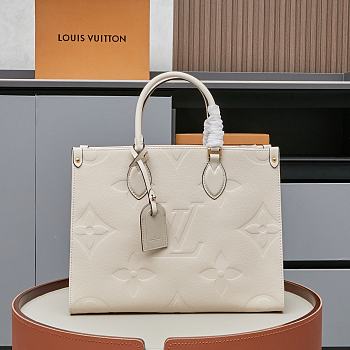 Louis Vuitton OnTheGo MM tote bag in light beige Monogram Empreinte calf leather 35x27x 14 cm