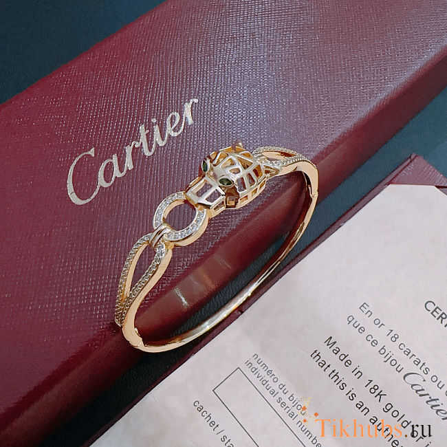 Panthère de Cartier bracelet in yellow gold with emeralds - 1