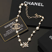 Chanel gold-tone metal and faux pearl necklace with crystal embellishments - 1
