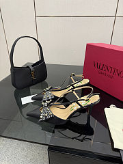 Valentino Garavani Bowow 85 studded leather slingback pumps in black - 1