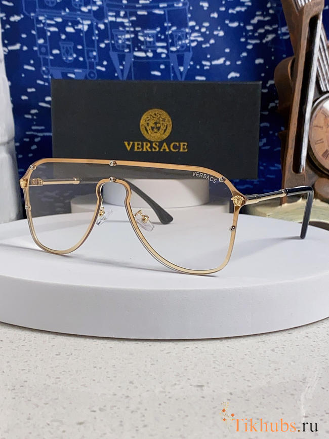 Versace pilot-style eyeglasses with a gold metal frame  - 1