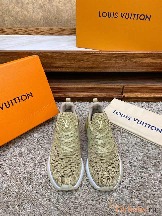Louis Vuitton V.N.R. (Vuitton New Runner) sneakers in a metallic gold - 1