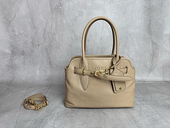 Miu Miu Aventure nappa leather top-handle bag in a beige color 22x 30x10cm