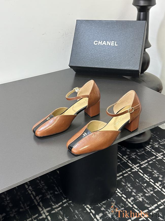 Chanel slingback heels in a brown color  - 1