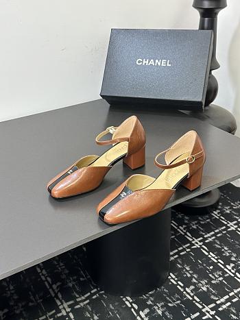 Chanel slingback heels in a brown color 