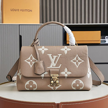 Louis Vuitton Madeleine MM bag in Bicolor Monogram Empreinte leather 30x19.5x11 cm