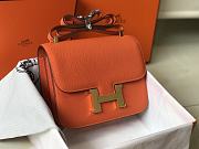 Hermès Constance 18 bag, featuring orange leather with gold hardware  - 5