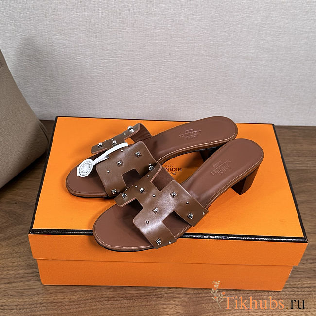 Hermes Oasis sandals in a brown leather with stud details - 1