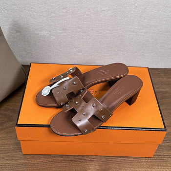 Hermes Oasis sandals in a brown leather with stud details
