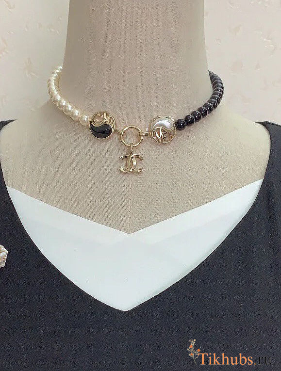 Chanel necklace is the A23C Pearl Coco Mark - 1