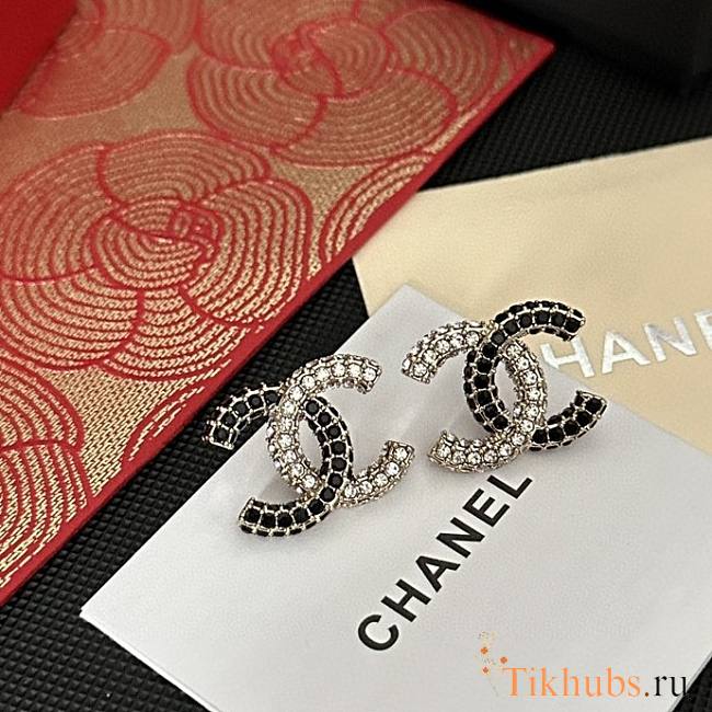Chanel CC earrings are crafted with black and clear crystals - 1