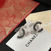 Chanel CC earrings are crafted with black and clear crystals - 1