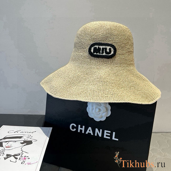 Miu Miu bucket hat features a woven straw - 1