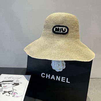 Miu Miu bucket hat features a woven straw