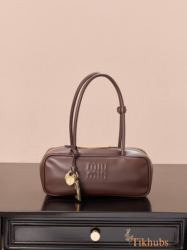 Miu Miu Beau leather bag is a luxurious handbag in dark brown color 28*11.5*8cm - 1
