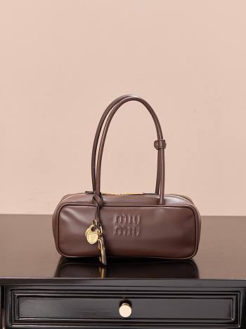 Miu Miu Beau leather bag is a luxurious handbag in dark brown color 28*11.5*8cm