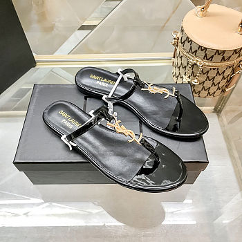 Saint Laurent Cassandra flat sandals in black patent leather