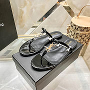 Saint Laurent Cassandra flat sandals in black patent leather - 6