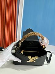 Louis Vuitton Capucines mini handbag in black with crystal-embellished logo 13.6x8x21 cm - 5