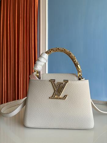 Louis Vuitton Capucines mini handbag in powder beige with crystal-embellished logo 13.6x8x21 cm