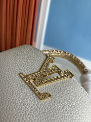 Louis Vuitton Capucines mini handbag in powder beige with crystal-embellished logo 13.6x8x21 cm - 5