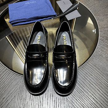 Prada Men Brushed Leather Loafers in black
