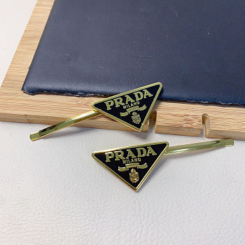 Prada metal hair clips gold